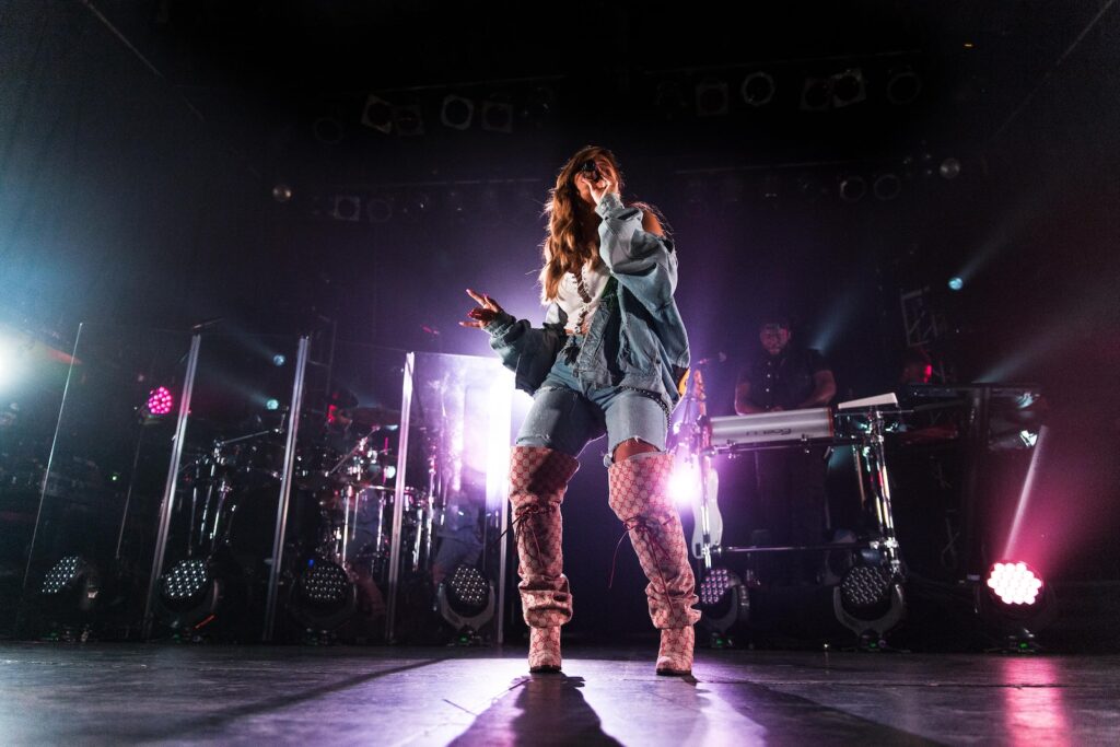 Woman Singing on Stage