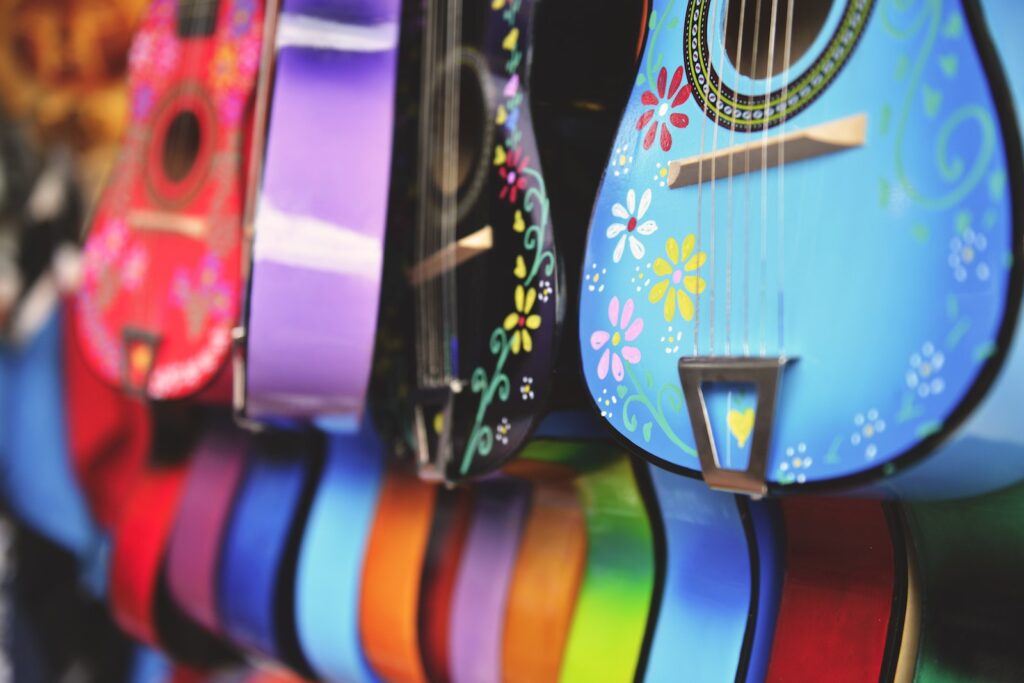 Blue, Purple and Green Acoustic Guitars